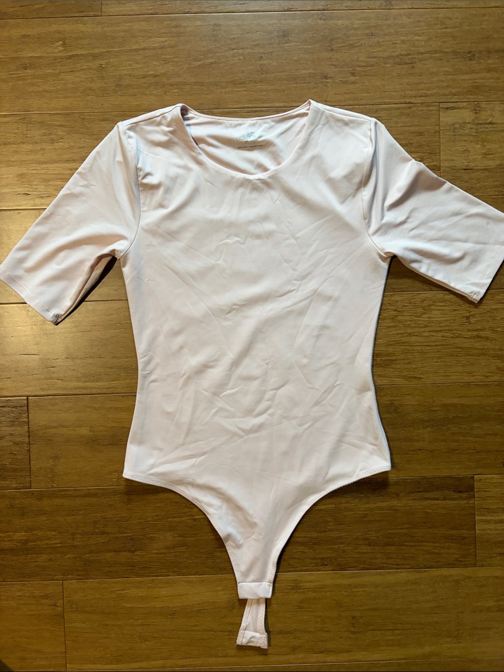 Light Pink One-Piece Bodysuit